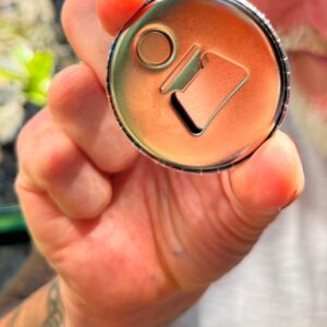 Fridge magnet with bottle opener